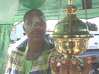 Tina with brass incense burner